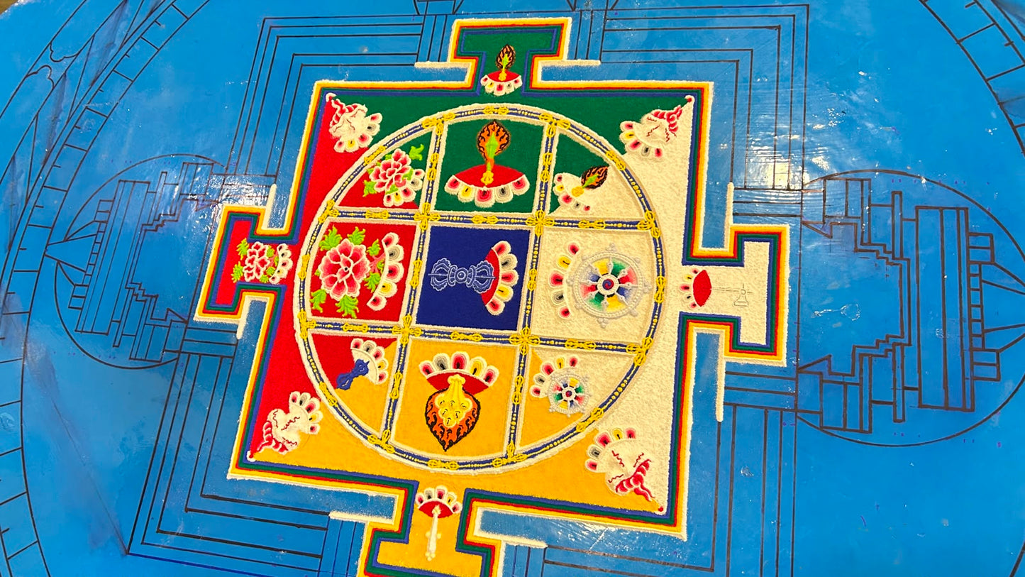 The completed Thirteen-Deity Vajrabhairava coloured-sand mandala at Sed Gyued Monastery, 2026